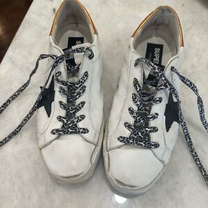 White Golden Goose Sneakers with Black Star and Leopard Laces
